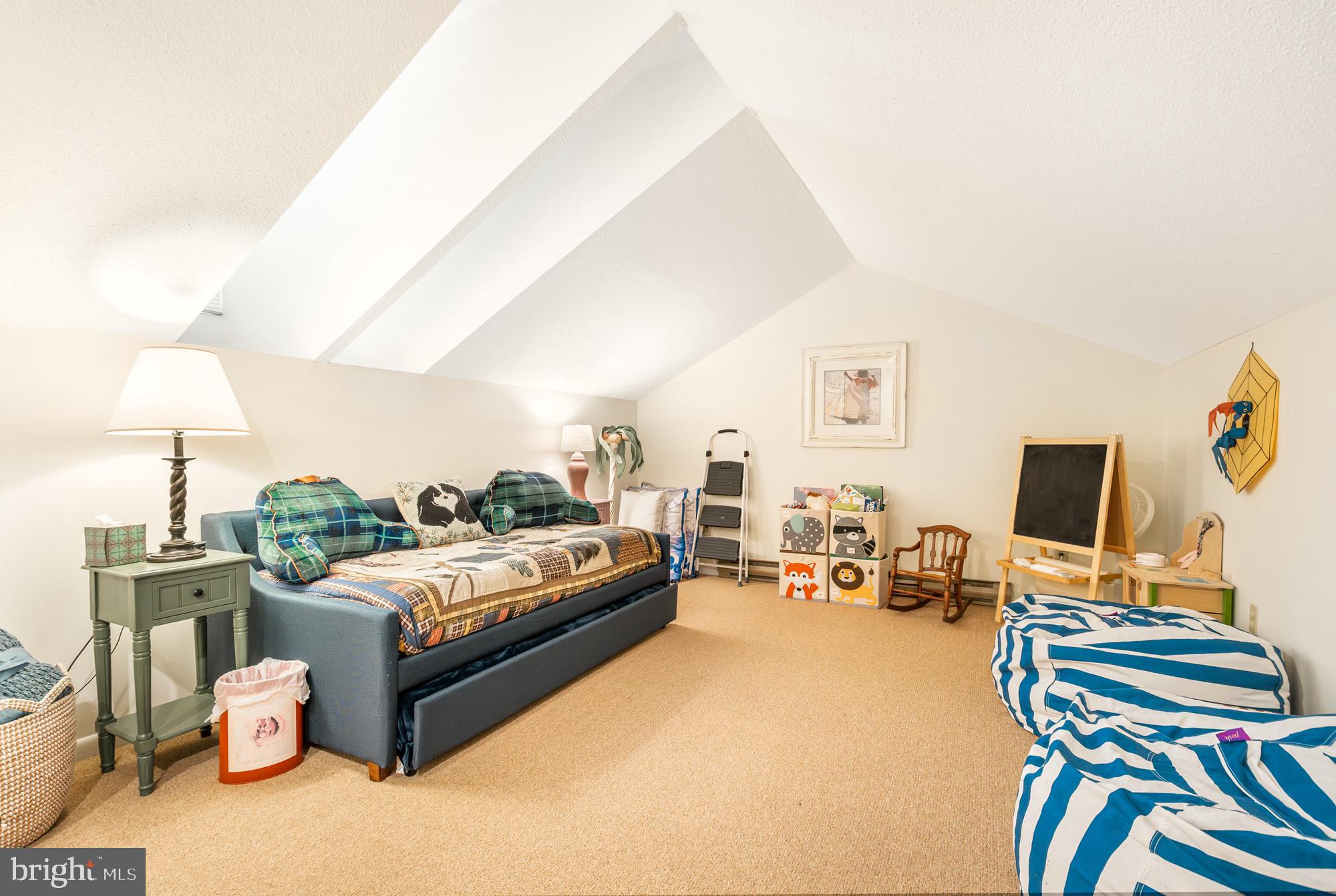 6 Winding Way, Unit 19C McHenry, MD 21541 - Photo 26 of 62 a living room with furniture and a flat screen tv
