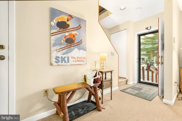 a view of living room with furniture and washer