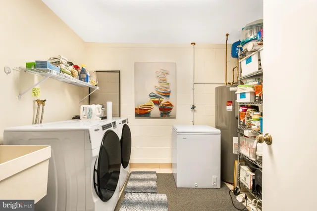 a view of a balcony with a table and chairs