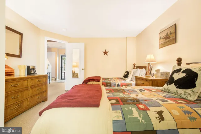 a view of a chairs and table in the balcony