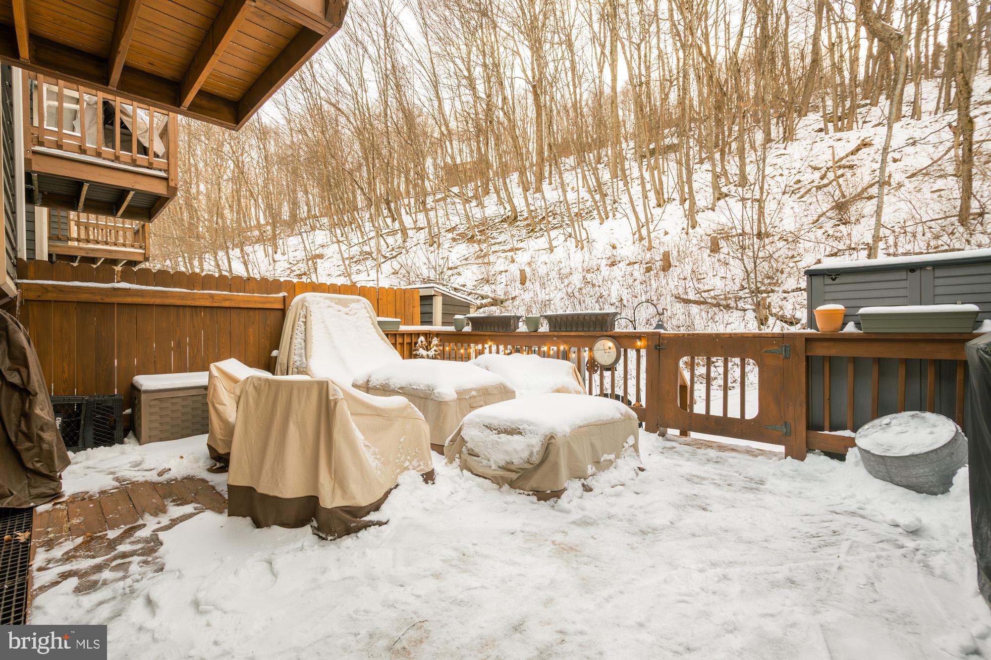 6 Winding Way, Unit 19C McHenry, MD 21541 - Photo 53 of 62 a view of balcony with two chair and table