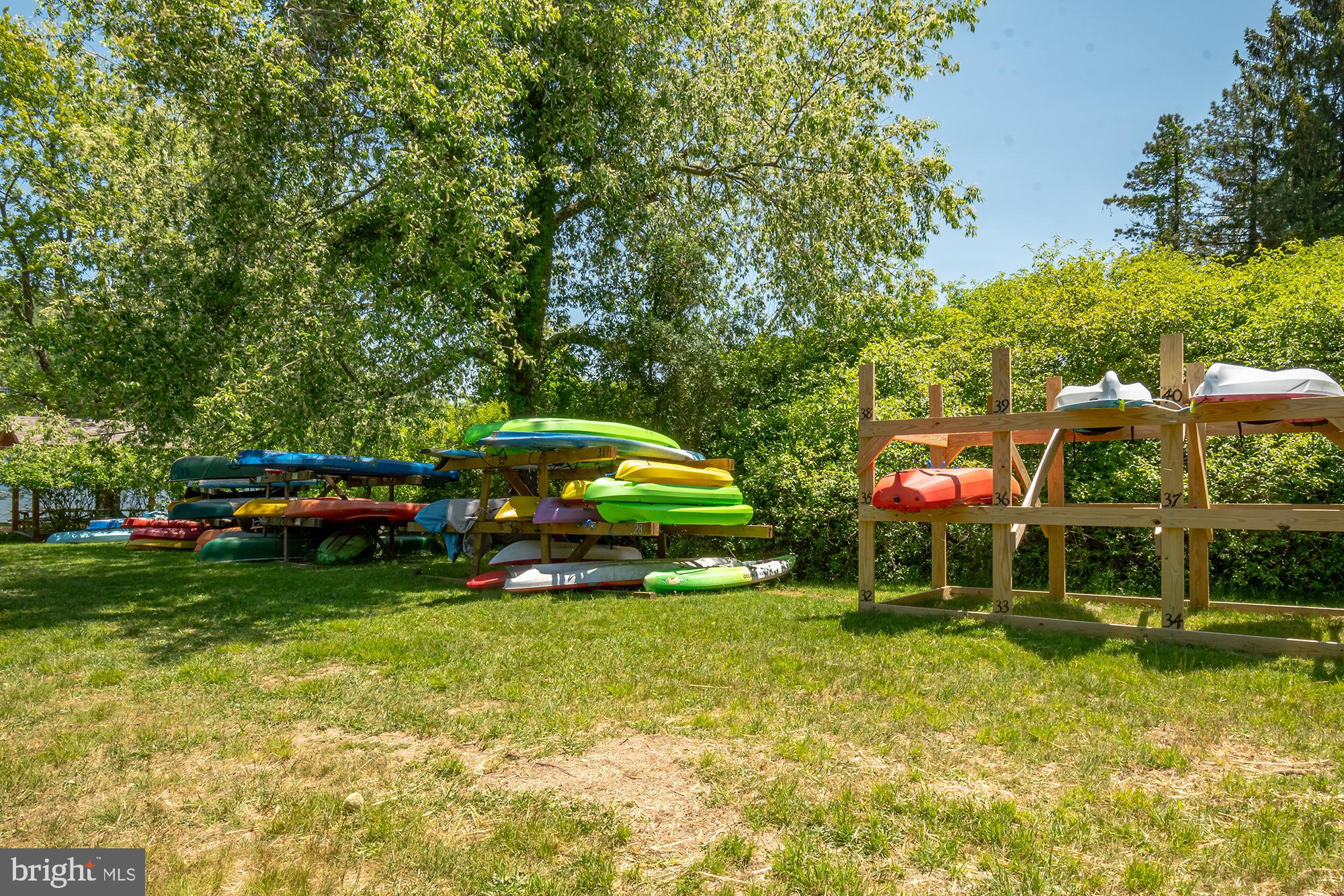 6 Winding Way, Unit 19C McHenry, MD 21541 - Photo 57 of 62 a childrens park with lots of swings and slides