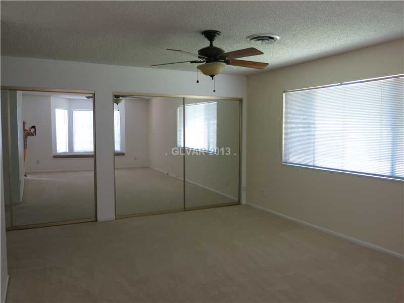1457 Rawhide Road Boulder City, NV 89005 - Photo 7 of 12 Master Bedroom. Large Master Suite with Sitting Area