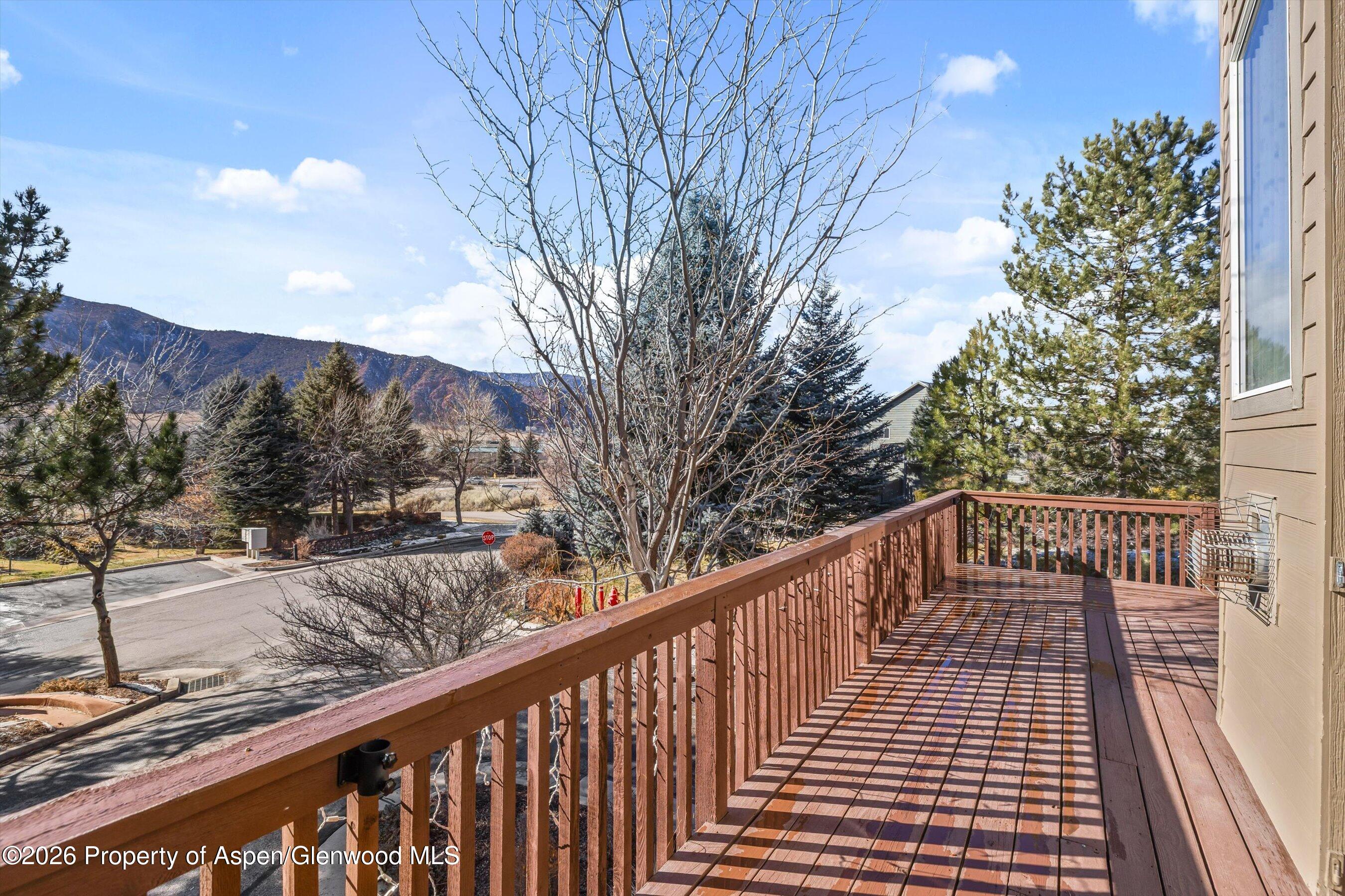 1 Pine Ridge Road Basalt, CO 81621 - Photo 13 of 32 a view of balcony with wooden floor and fence