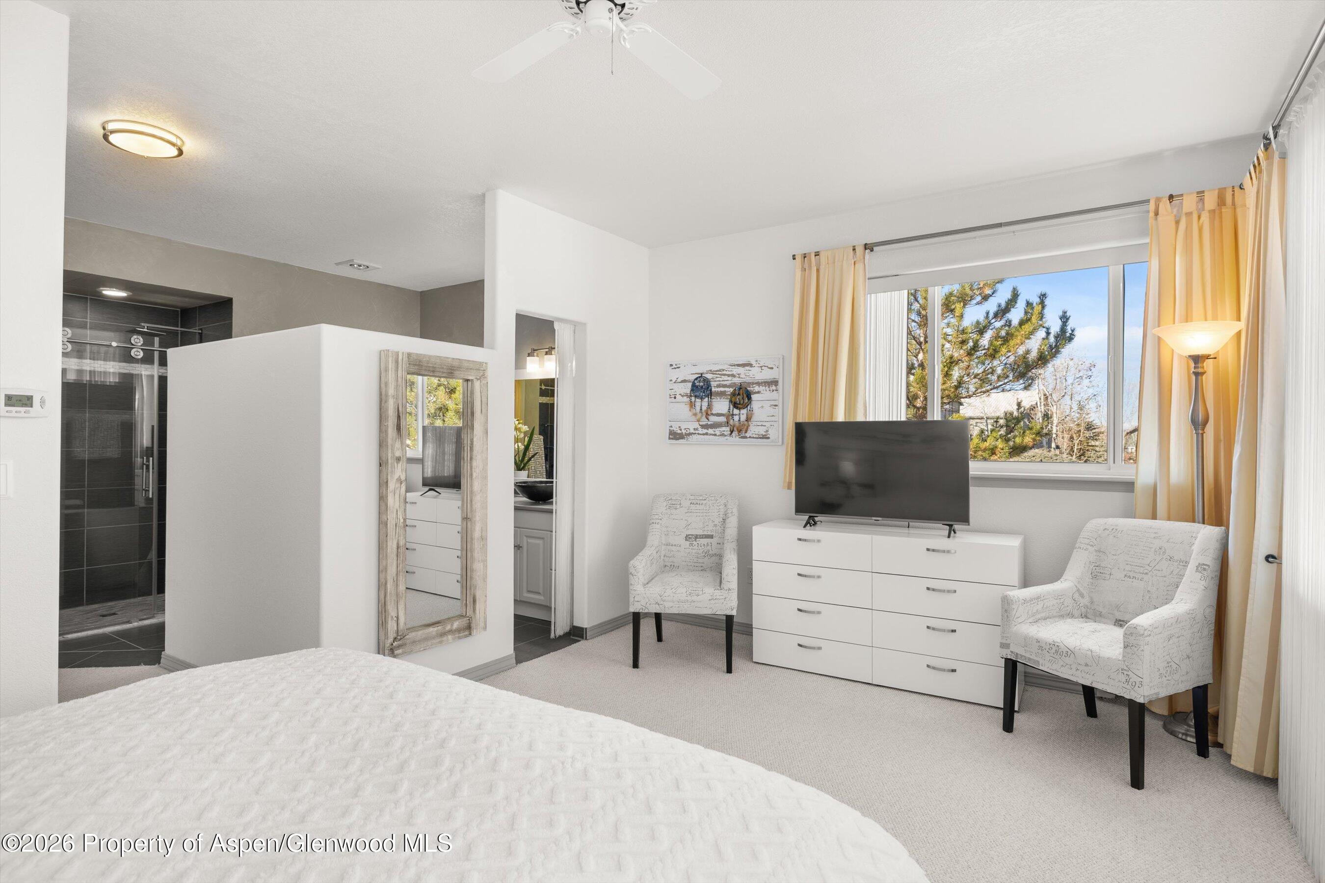 1 Pine Ridge Road Basalt, CO 81621 - Photo 15 of 32 a bedroom with furniture and a large window