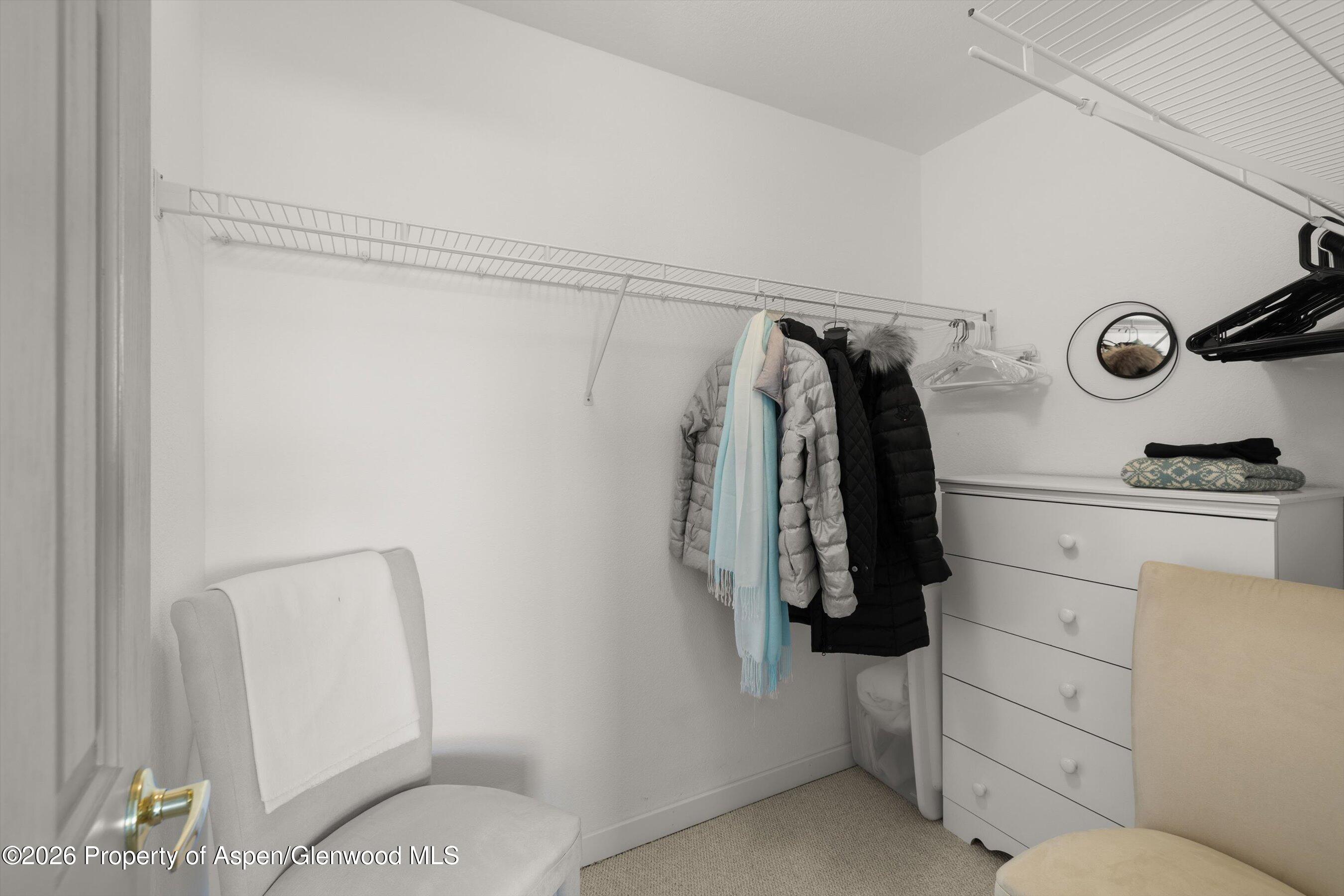 1 Pine Ridge Road Basalt, CO 81621 - Photo 23 of 32 a view of walk in closet with clothes and shoes