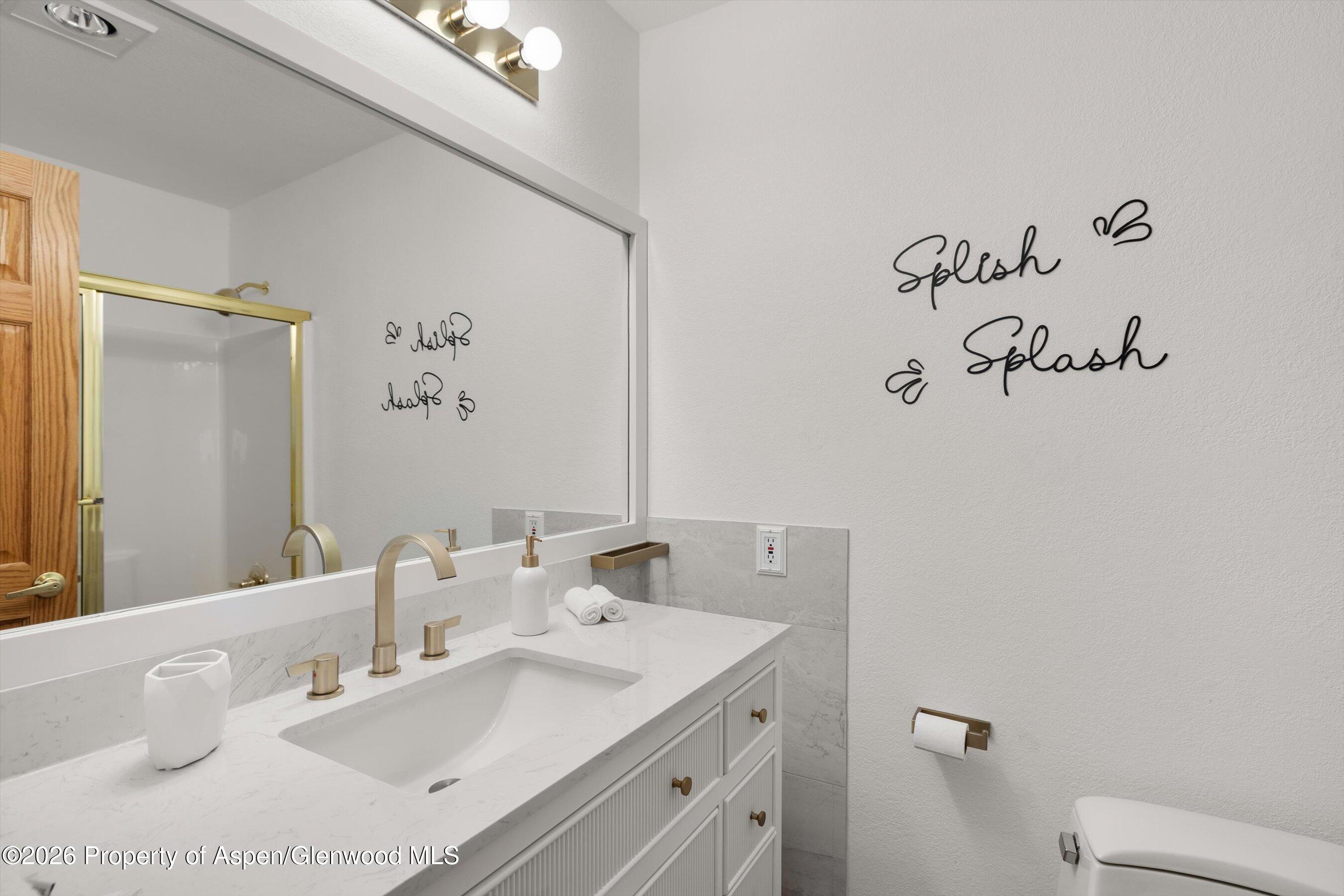 1 Pine Ridge Road Basalt, CO 81621 - Photo 26 of 32 a bathroom with a sink and a mirror