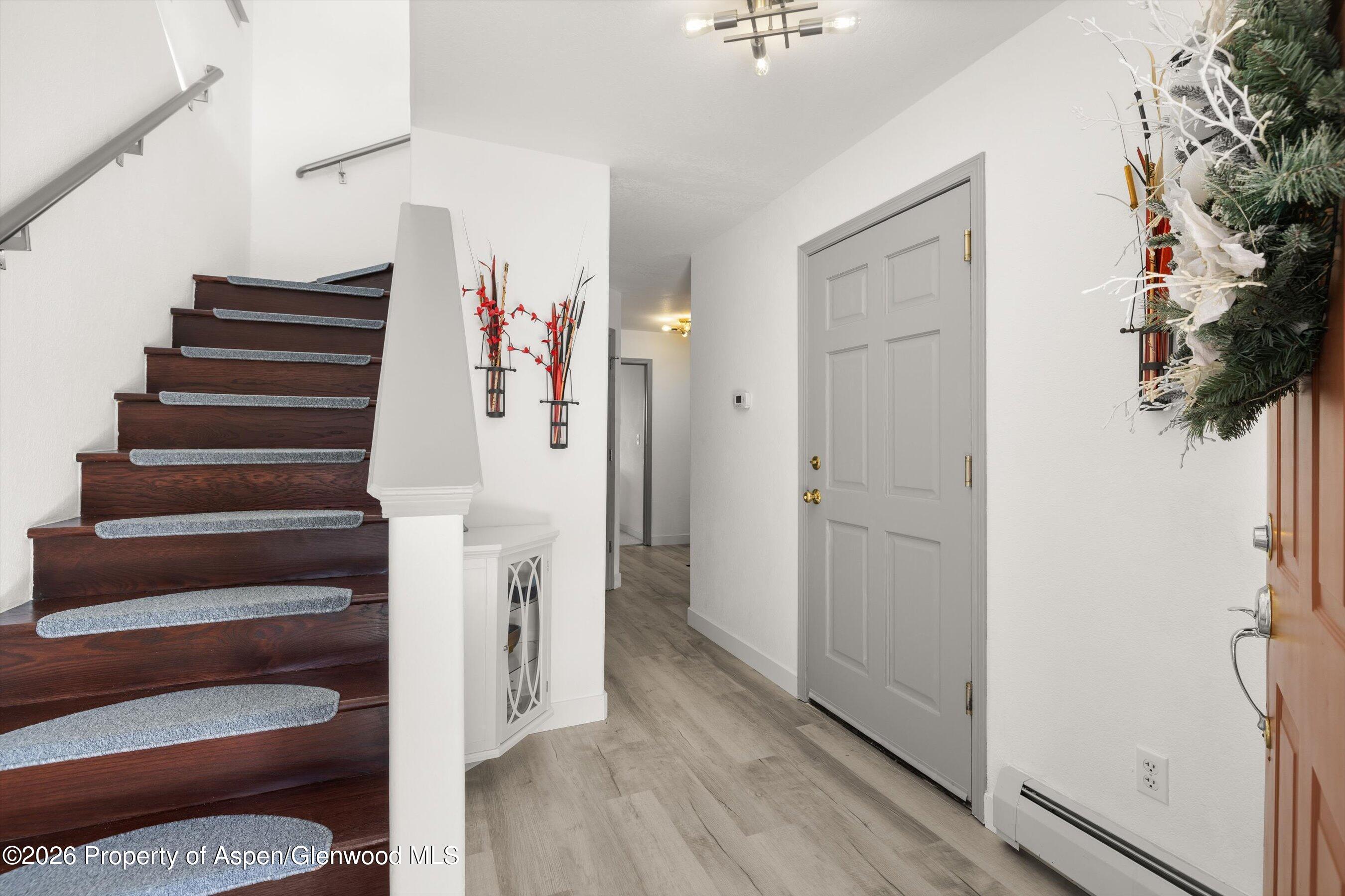 1 Pine Ridge Road Basalt, CO 81621 - Photo 3 of 32 a view of entryway with stairs and wooden floor