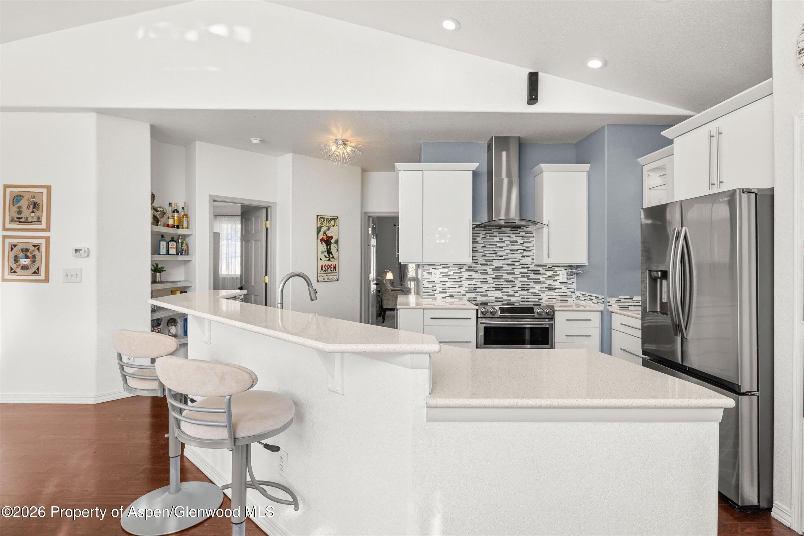 1 Pine Ridge Road Basalt, CO 81621 - Photo 9 of 32 a large kitchen with a table and chairs
