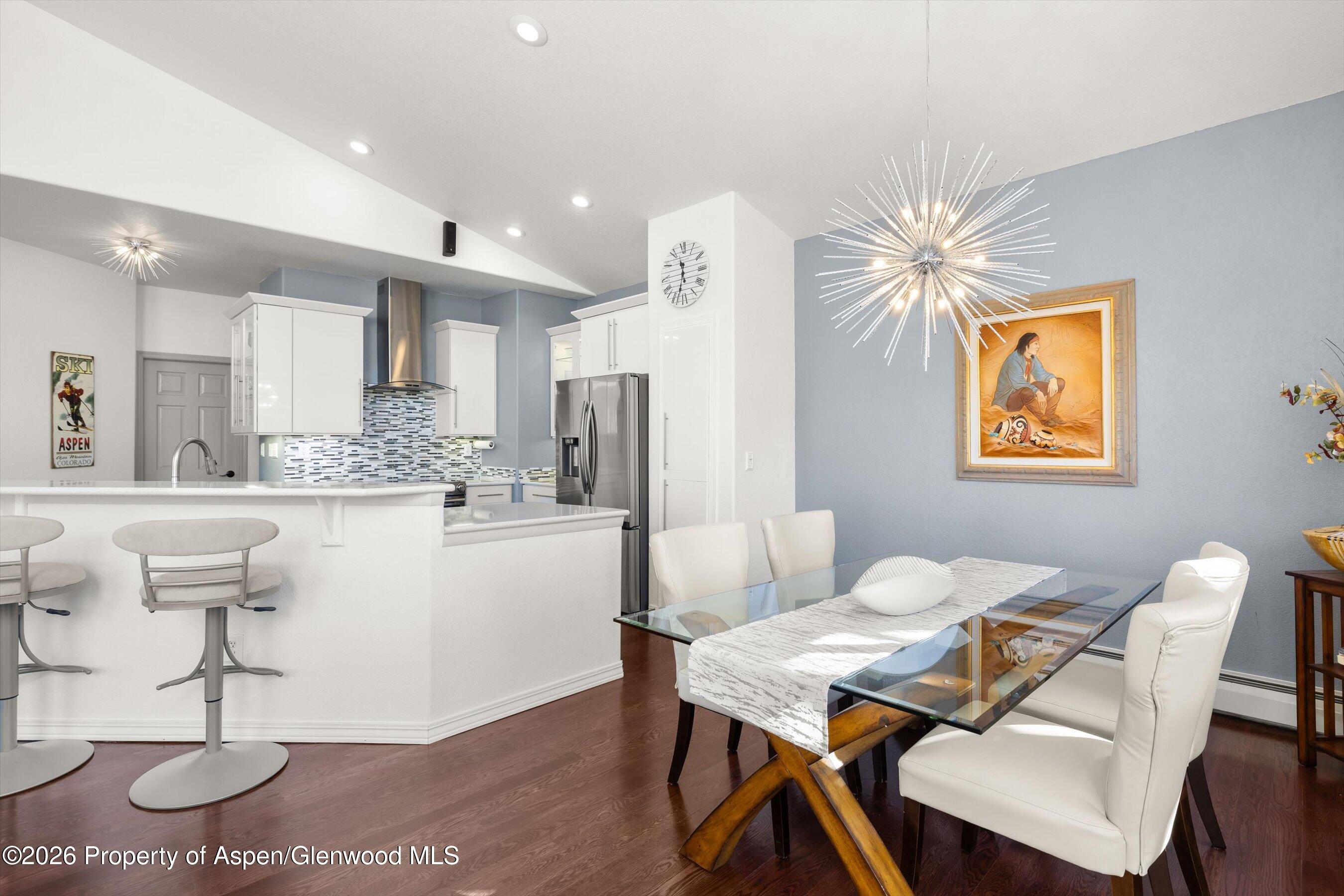 1 Pine Ridge Road Basalt, CO 81621 - Photo 10 of 32 a view of a dining room with furniture and a chandelier