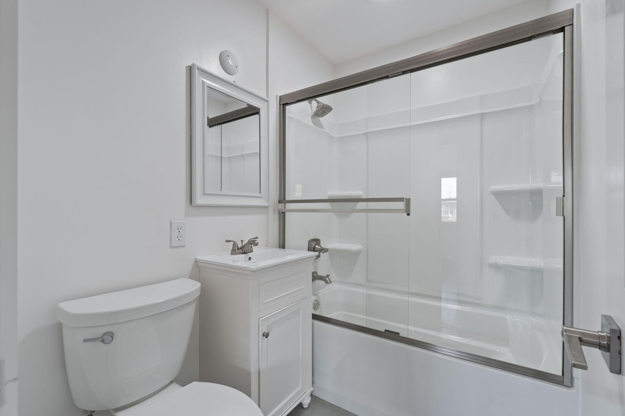 630 Shrewsbury Road Mary Esther, FL 32569 - Photo 21 of 39 a bathroom with a sink mirror vanity and toilet