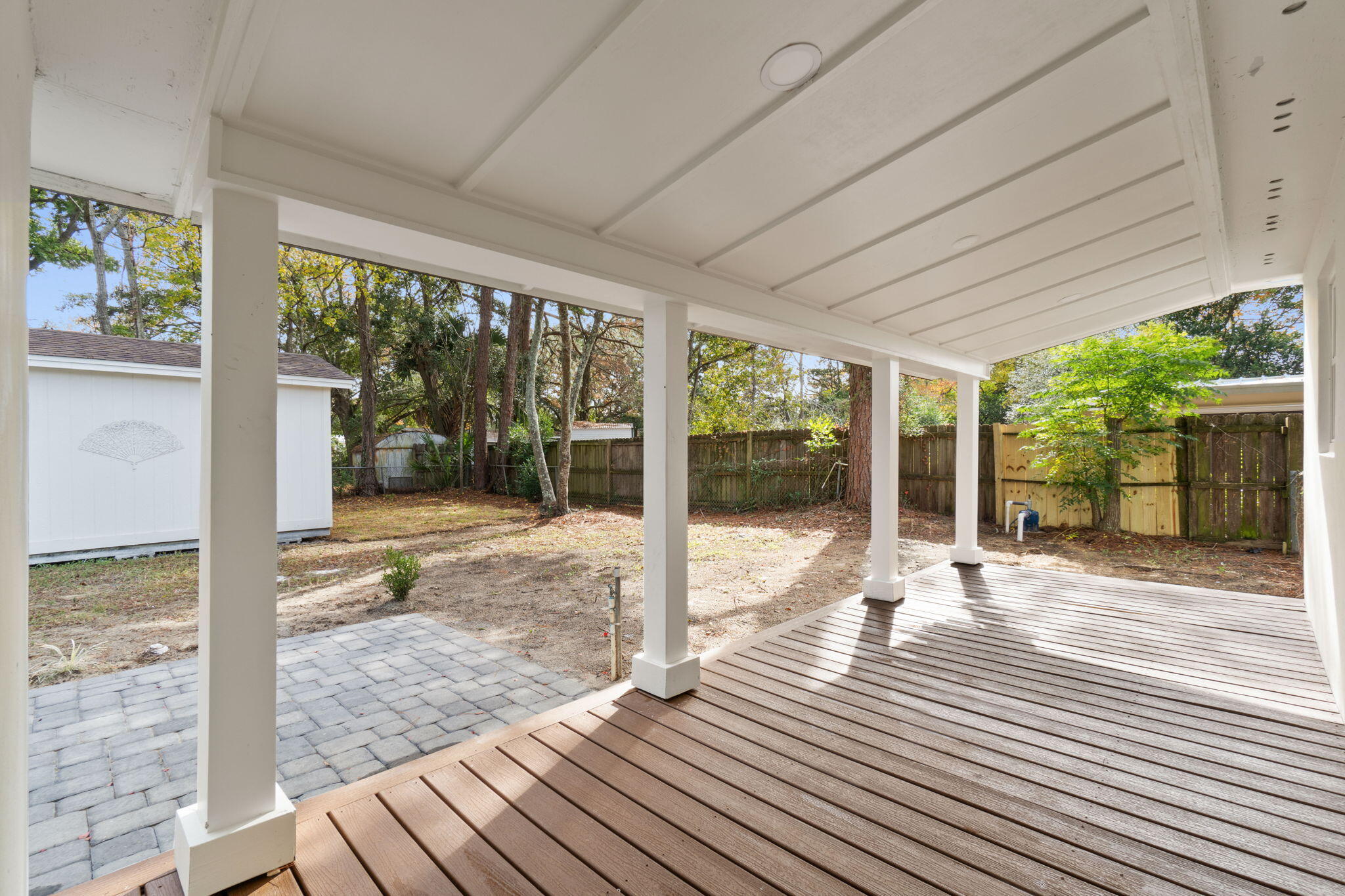630 Shrewsbury Road Mary Esther, FL 32569 - Photo 30 of 39 a view of porch with wooden floor and floor to ceiling window