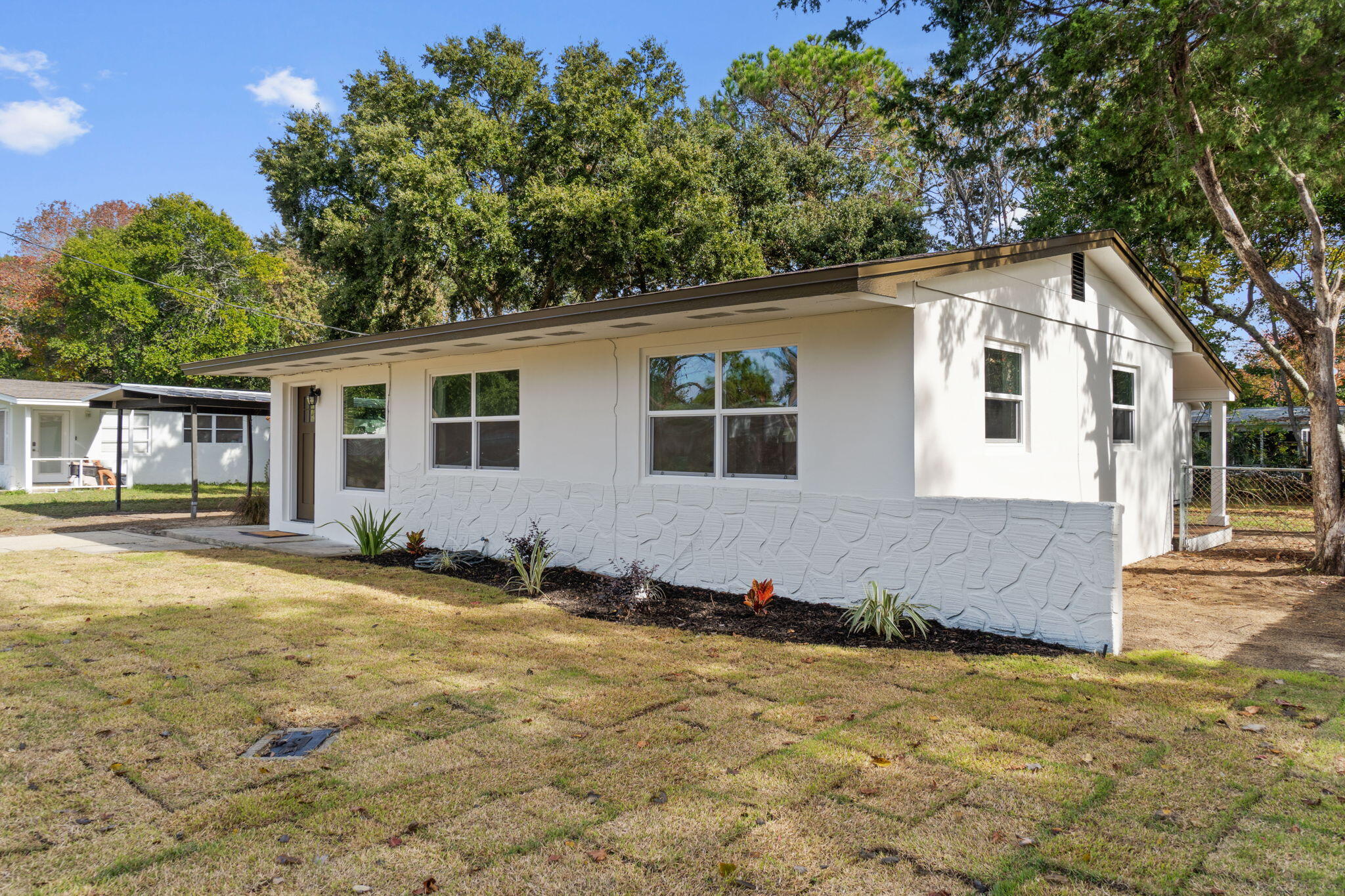 630 Shrewsbury Road Mary Esther, FL 32569 - Photo 37 of 39 a front view of a house with a yard