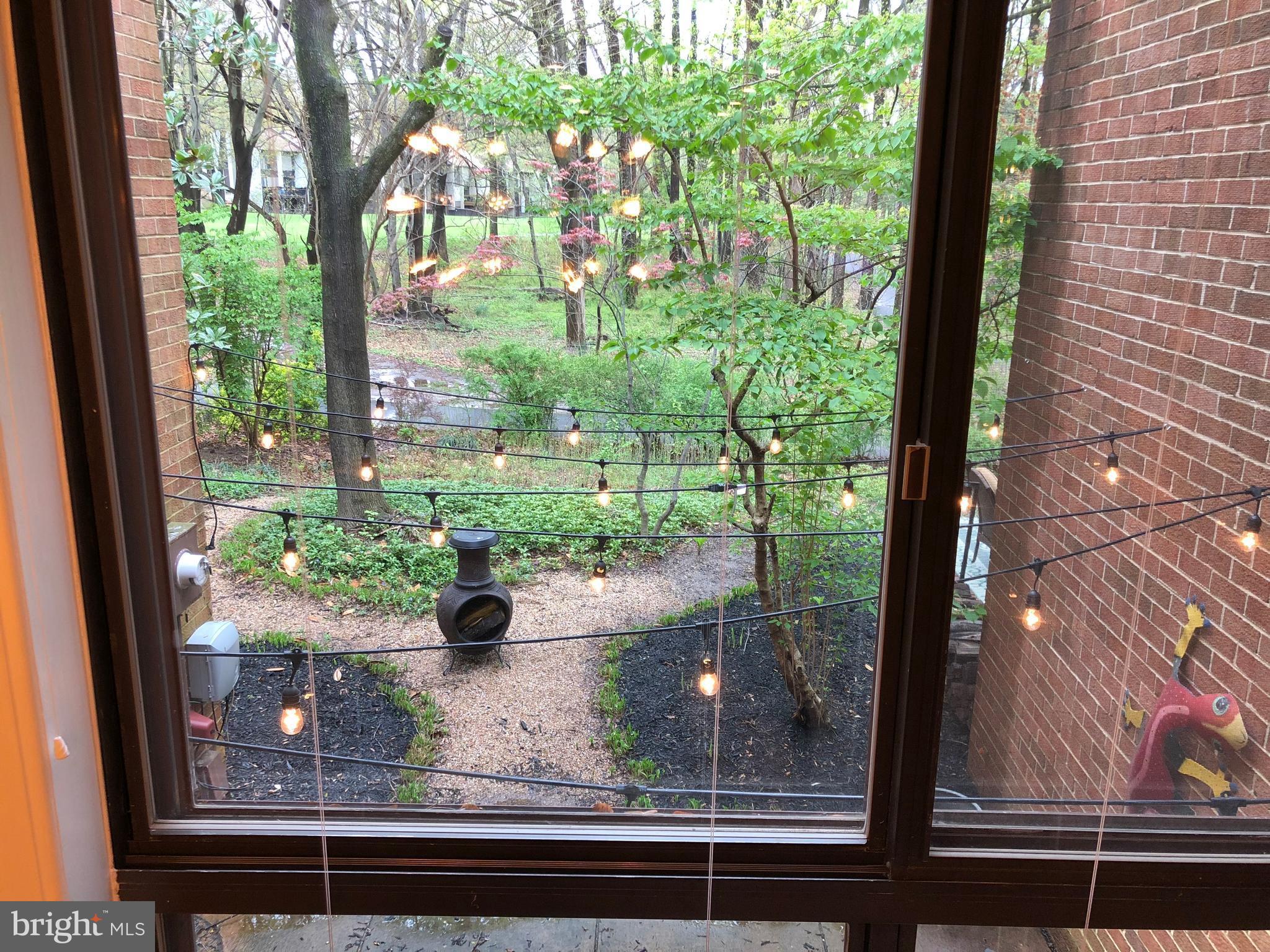11613 Hunters Green Court Reston, VA 20191 - Photo 3 of 19 a view of a back yard from a window
