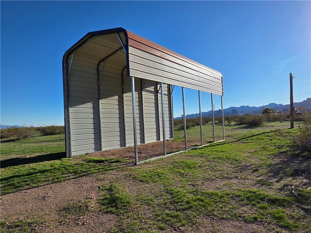 934 Elgin Road Golden Valley, AZ 86413 - Photo 15 of 23 View of outbuilding with a mountain view and a view of rural / pastoral area