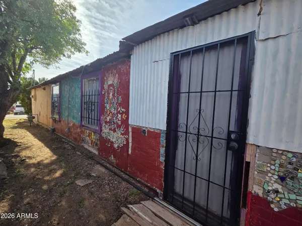 a view of a house with a wooden door