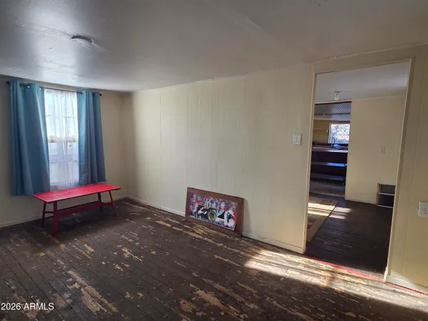 a view of an empty room and window