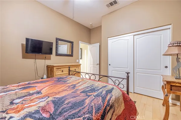 a bed room with a bed and a window
