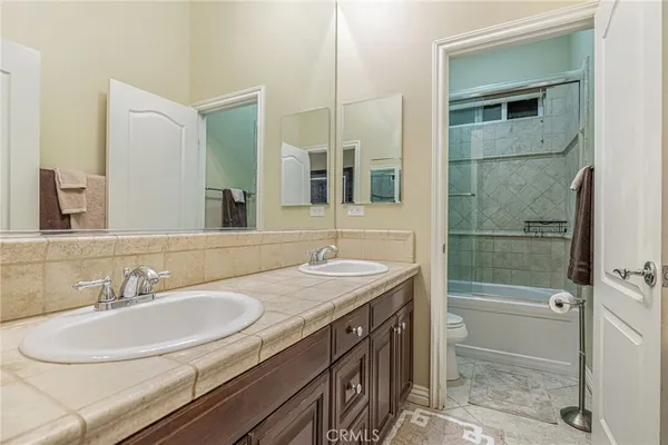 a bathroom with a tub and a shower
