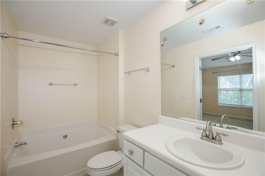 3801 Thayer Trace Duluth, GA 30096 - Photo 27 of 44 a bathroom with a sink toilet and shower