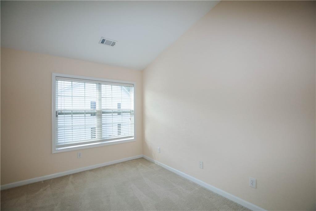 3801 Thayer Trace Duluth, GA 30096 - Photo 36 of 44 an empty room with a window