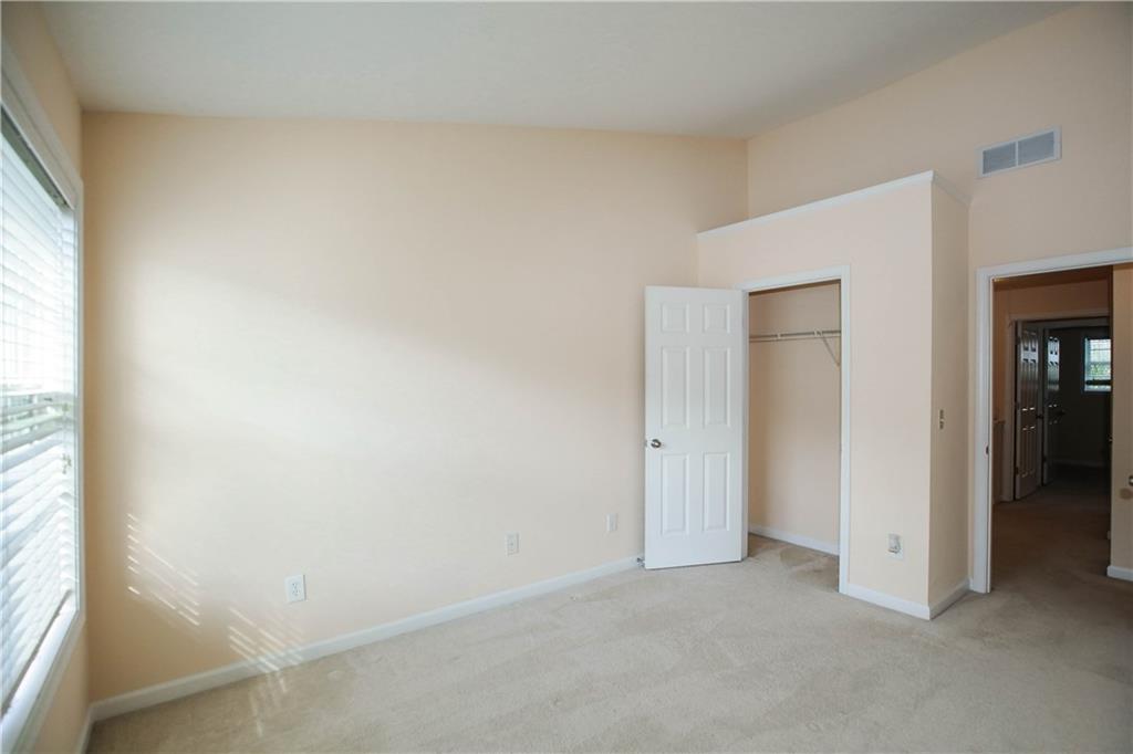 3801 Thayer Trace Duluth, GA 30096 - Photo 37 of 44 an empty room with windows