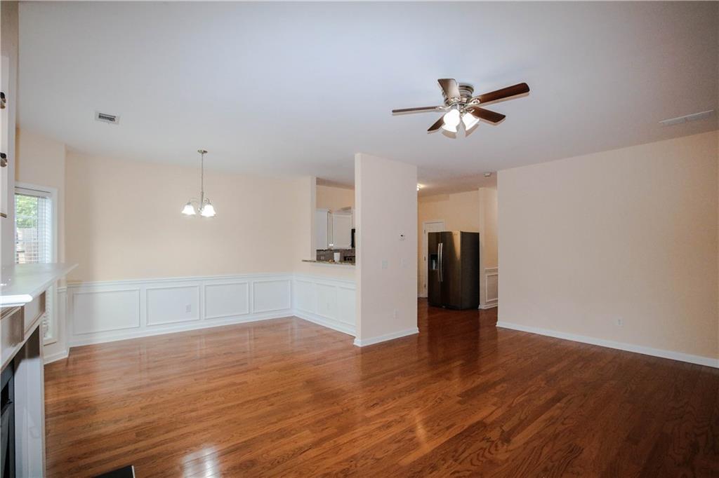 3801 Thayer Trace Duluth, GA 30096 - Photo 8 of 44 a view of empty room with wooden floor