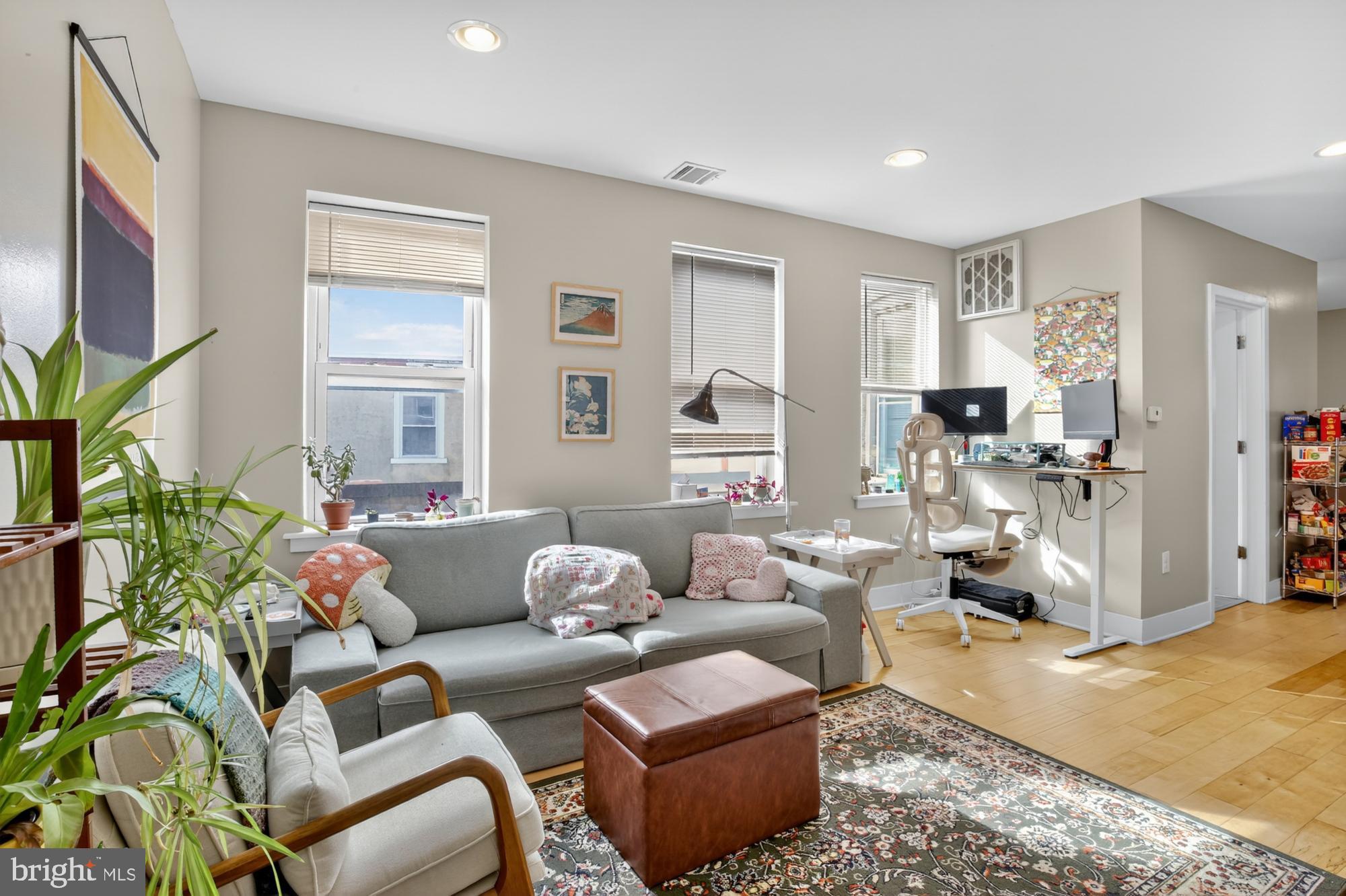 a living room with furniture or couch and a window