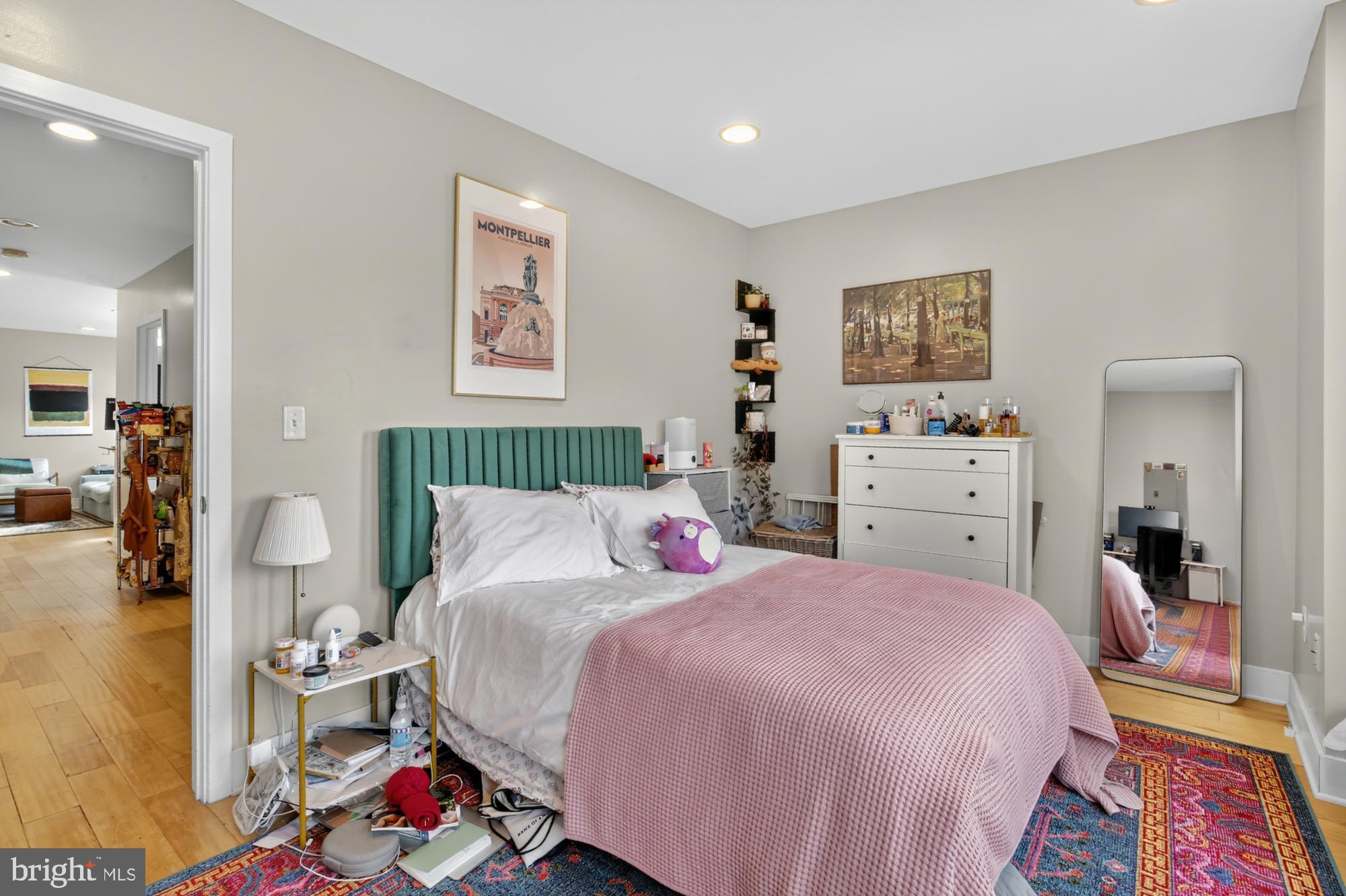 709 North 3rd Street, Unit 3 Philadelphia, PA 19123 - Photo 11 of 17 a bedroom with a bed and a lamp