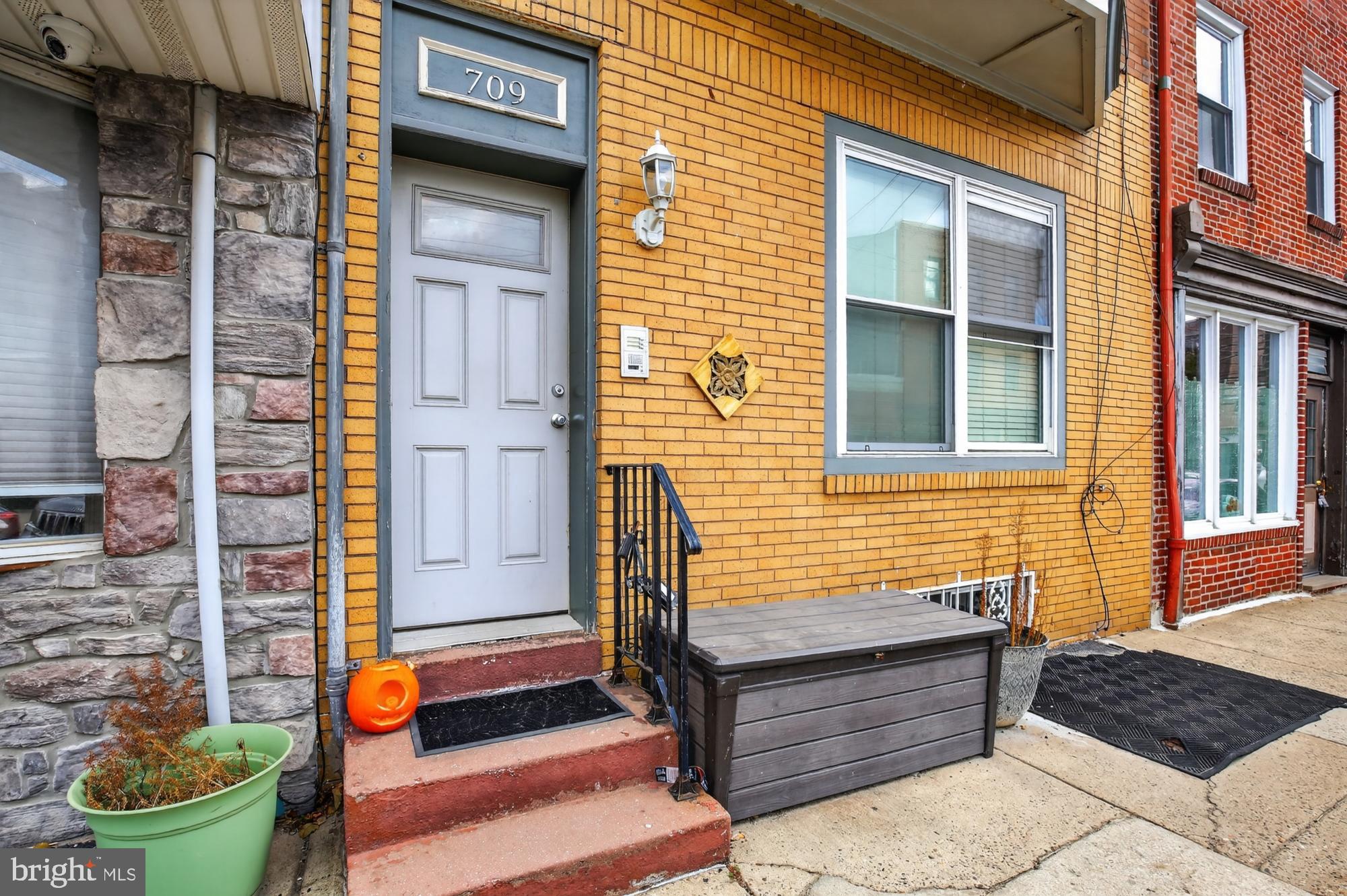 709 North 3rd Street, Unit 3 Philadelphia, PA 19123 - Photo 16 of 17 a front view of a house with outdoor seating