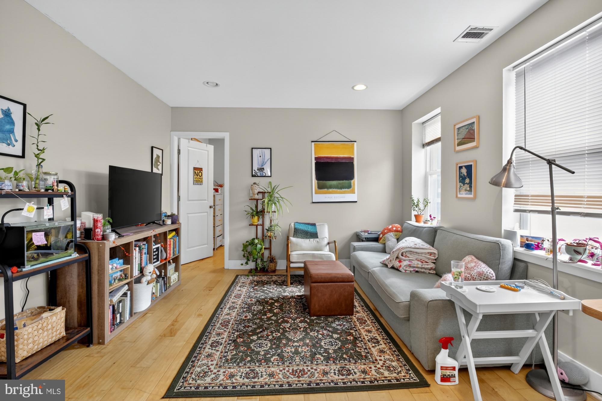709 North 3rd Street, Unit 3 Philadelphia, PA 19123 - Photo 3 of 17 a living room with furniture and a flat screen tv