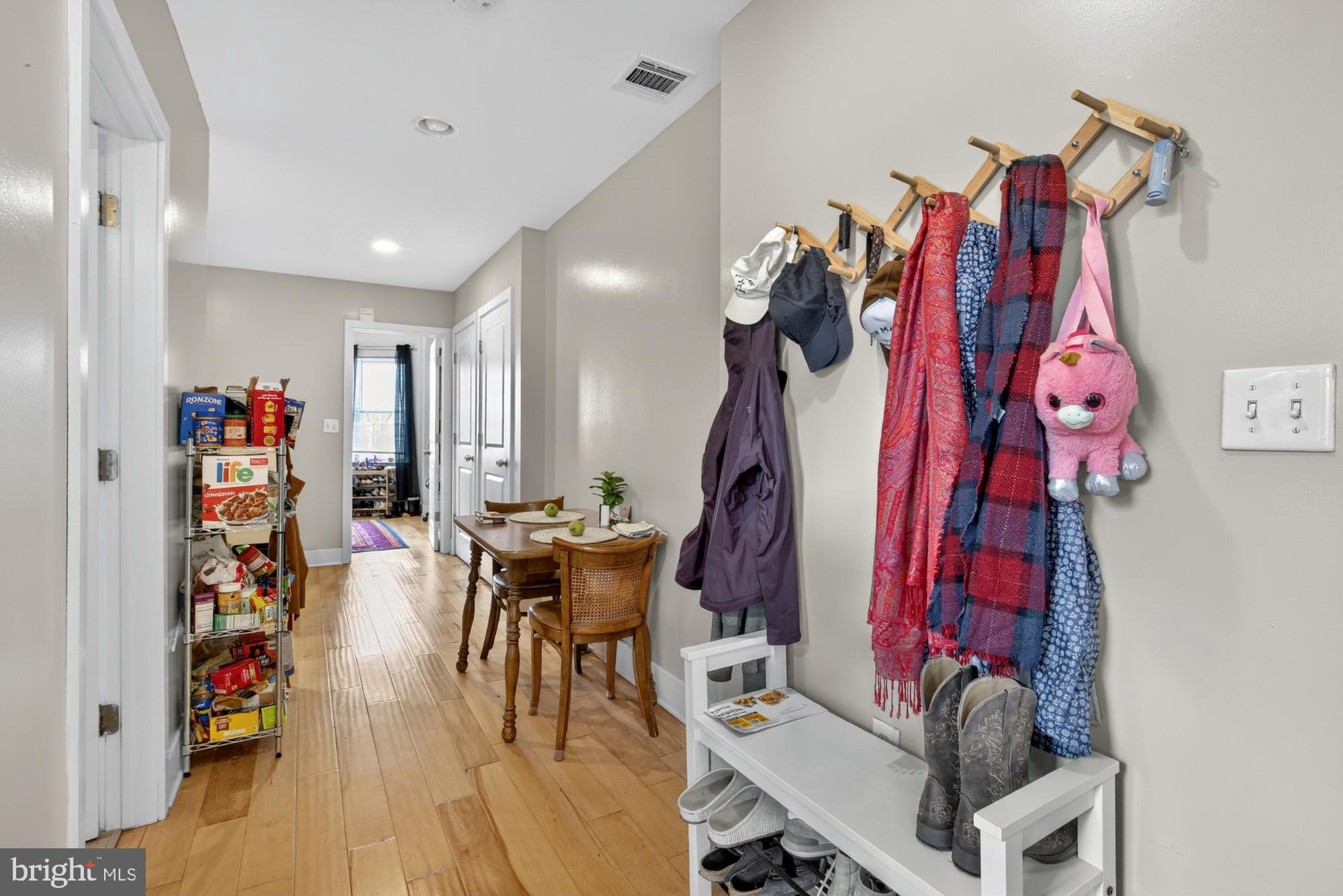 709 North 3rd Street, Unit 3 Philadelphia, PA 19123 - Photo 4 of 17 a view of a dining hall with furniture and wooden floor