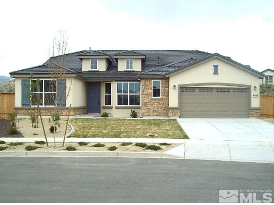 9261 Maplehurst Trail, Unit 4113 HOMEWOOD Reno, NV 89523 - Photo 1 of 1 a front view of a house with a yard