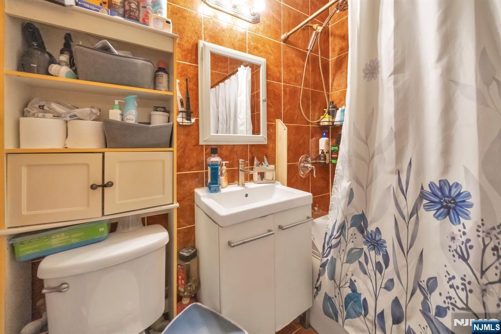 688 Passaic Avenue Nutley, NJ 07110 - Photo 12 of 42 a utility room with dryer and washer