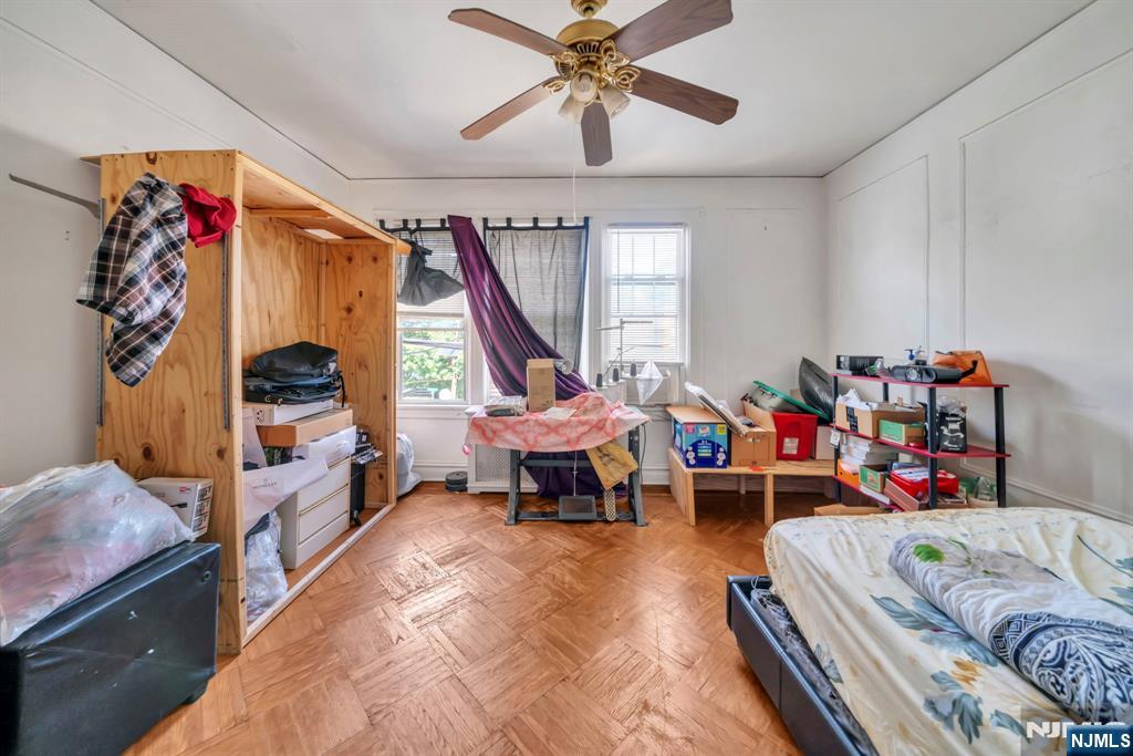 688 Passaic Avenue Nutley, NJ 07110 - Photo 16 of 42 a bedroom with furniture and a window