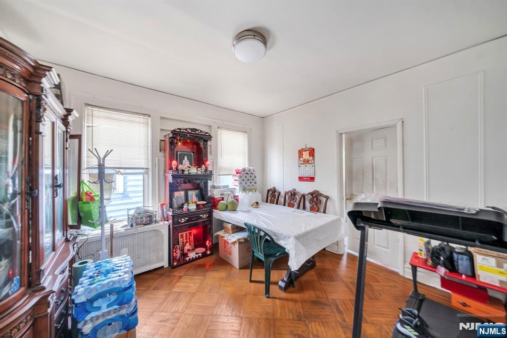 688 Passaic Avenue Nutley, NJ 07110 - Photo 19 of 42 a living room with furniture and a book shelf