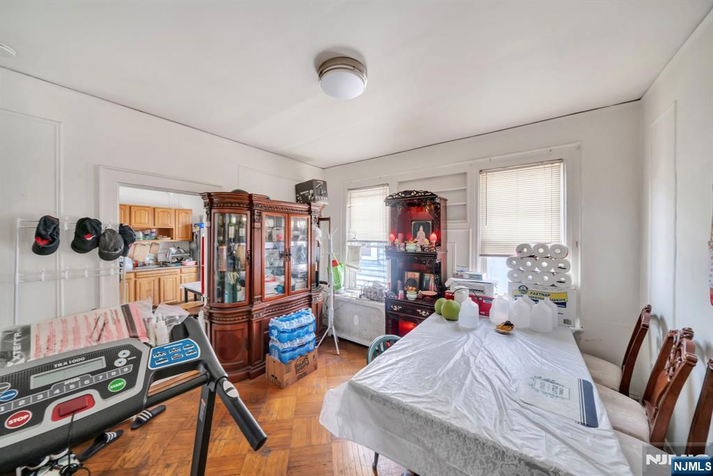 688 Passaic Avenue Nutley, NJ 07110 - Photo 20 of 42 a bed room with a bed and a flat screen tv