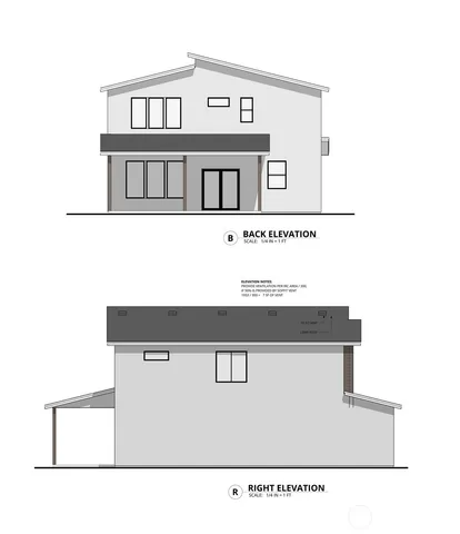 a black and white photo of a living room