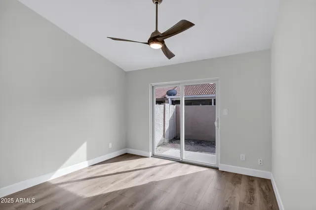 a view of an empty room and window