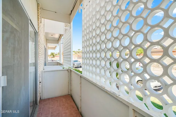 a bathroom with a sink and a shower curtain