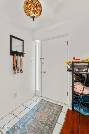 a kitchen with cabinets and appliances