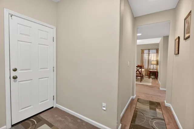 a kitchen that has a stove a microwave and a refrigerator