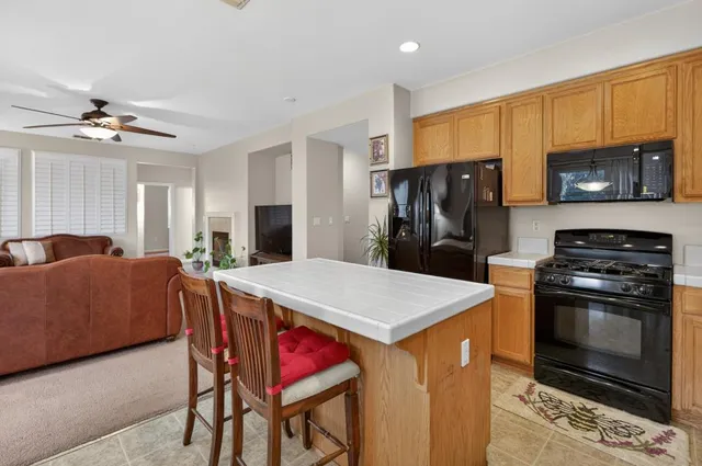 a bedroom with a large bed and dresser