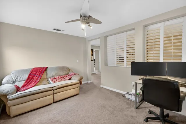 a front view of house with yard and seating area