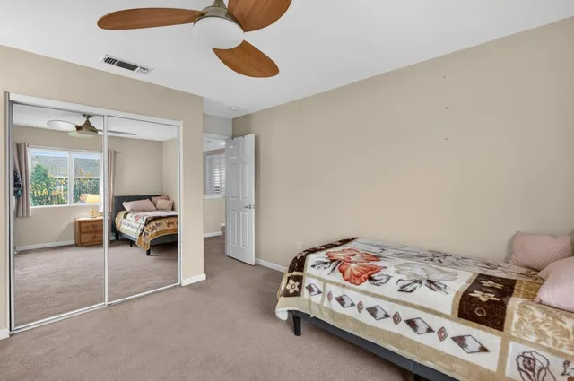 an aerial view of residential houses and outdoor space