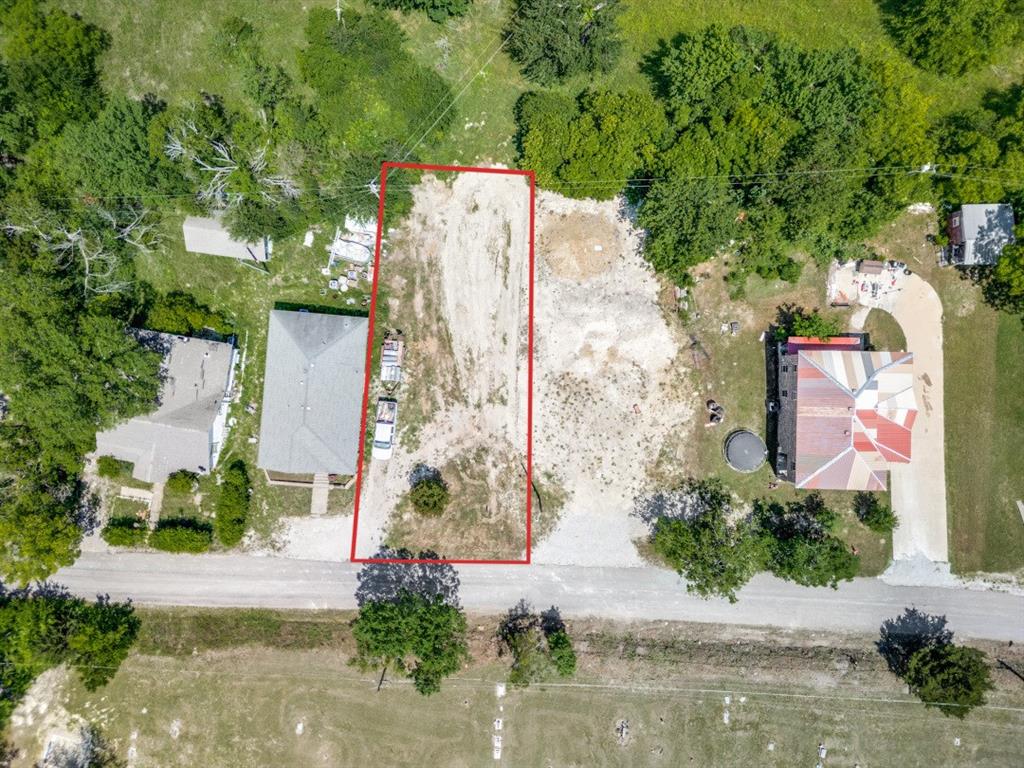 Tbd East Fulton Street Van Alstyne, TX 75495 - Photo 12 of 12 aerial view of a house with a yard and large trees