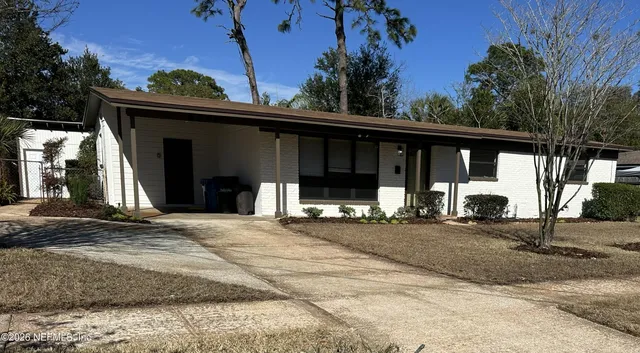 a front view of a house with a porch