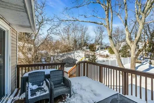 a view of a balcony with furniture