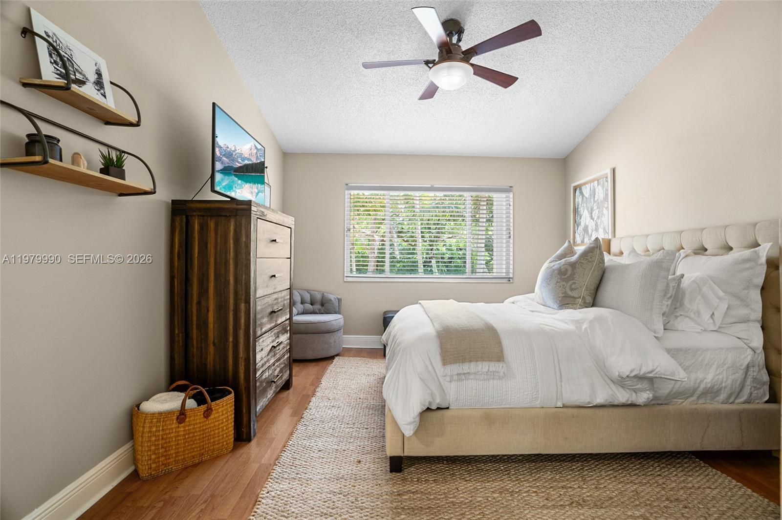 10978 Southwest 75th Terrace Miami, FL 33173 - Photo 11 of 34 a bedroom with a bed couch and a window