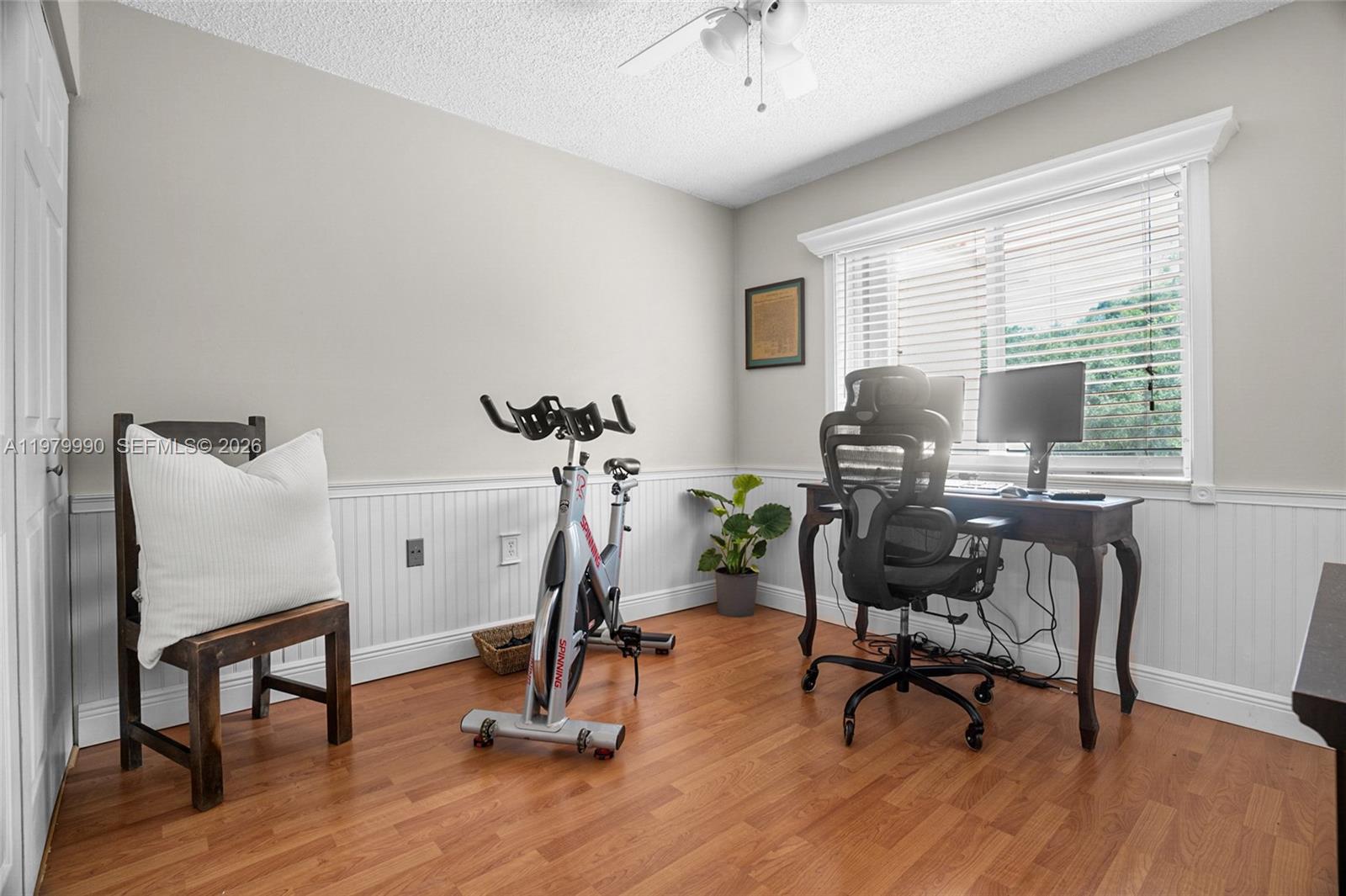 10978 Southwest 75th Terrace Miami, FL 33173 - Photo 15 of 34 a view of a workspace with furniture and a window